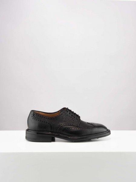 Sapatos perfurados Sapatos perfurados