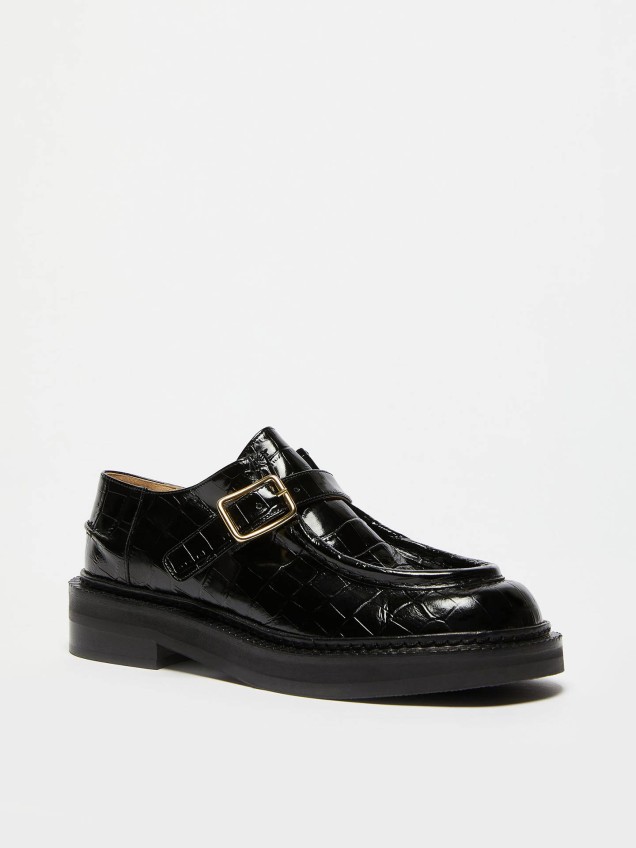 Loafers em Pele