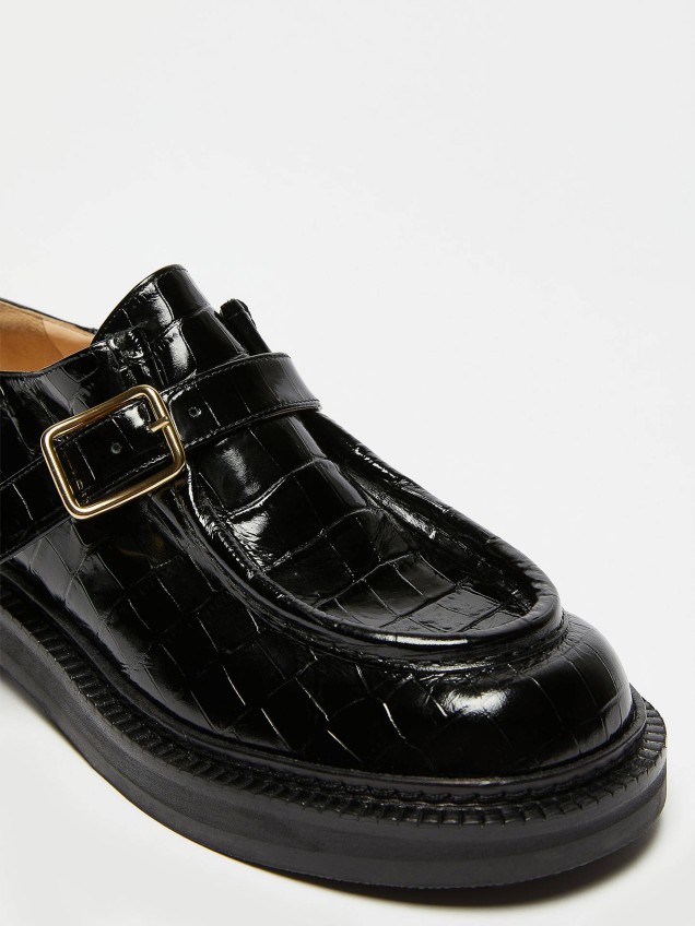 Loafers em Pele