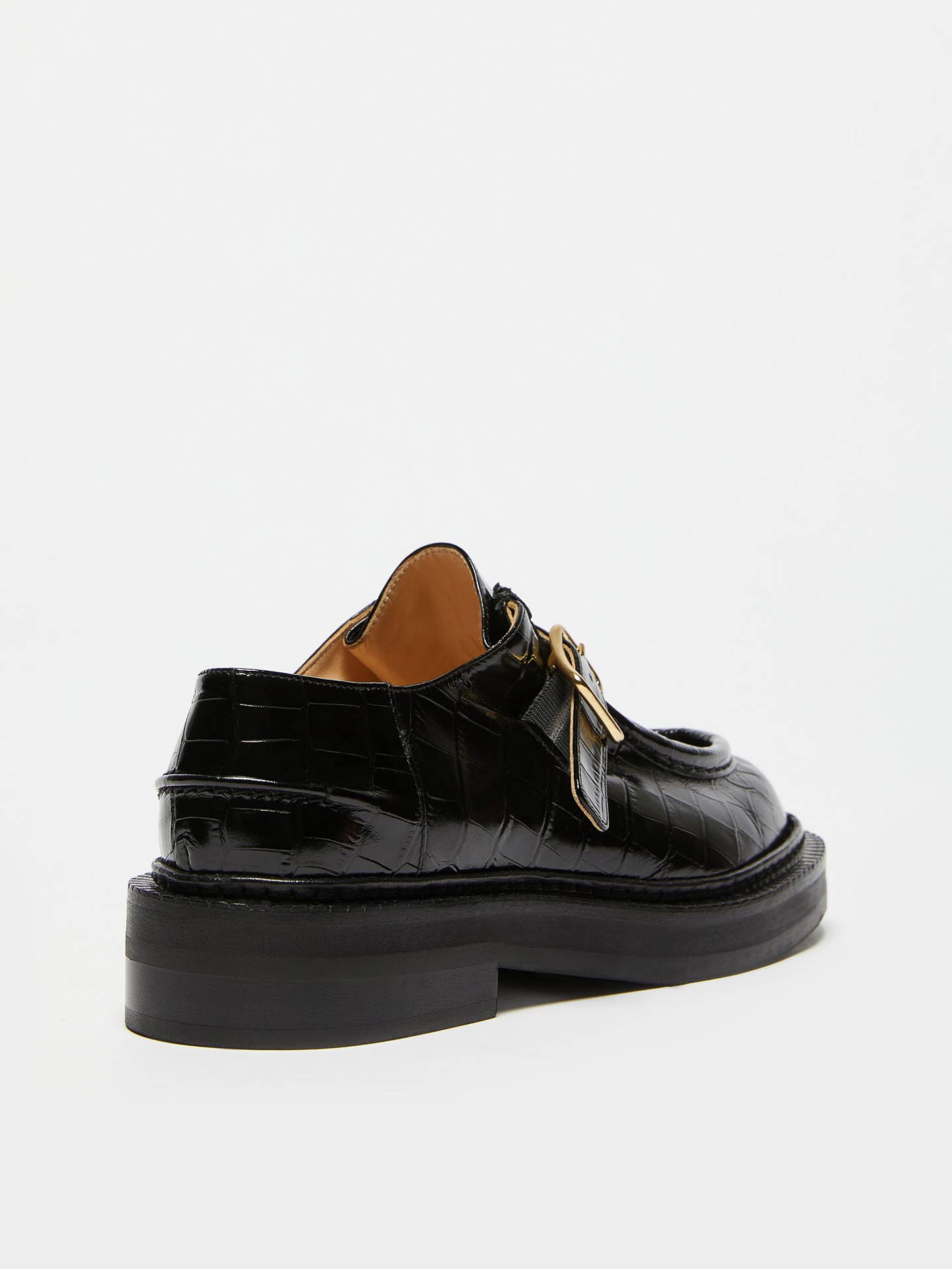 Loafers em Pele