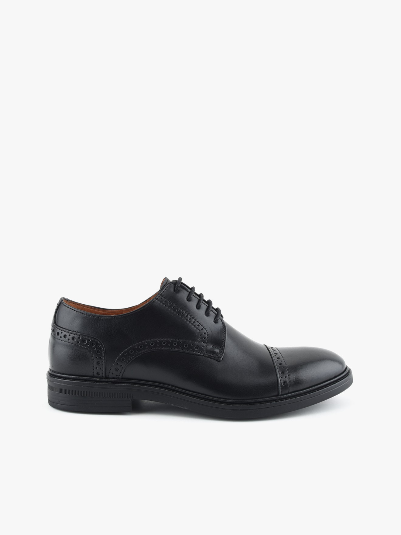 Sapatos em Pele