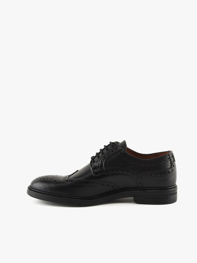 Sapatos em Pele