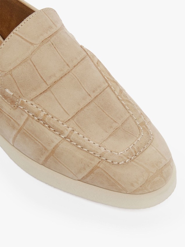 Sapatos de Pele