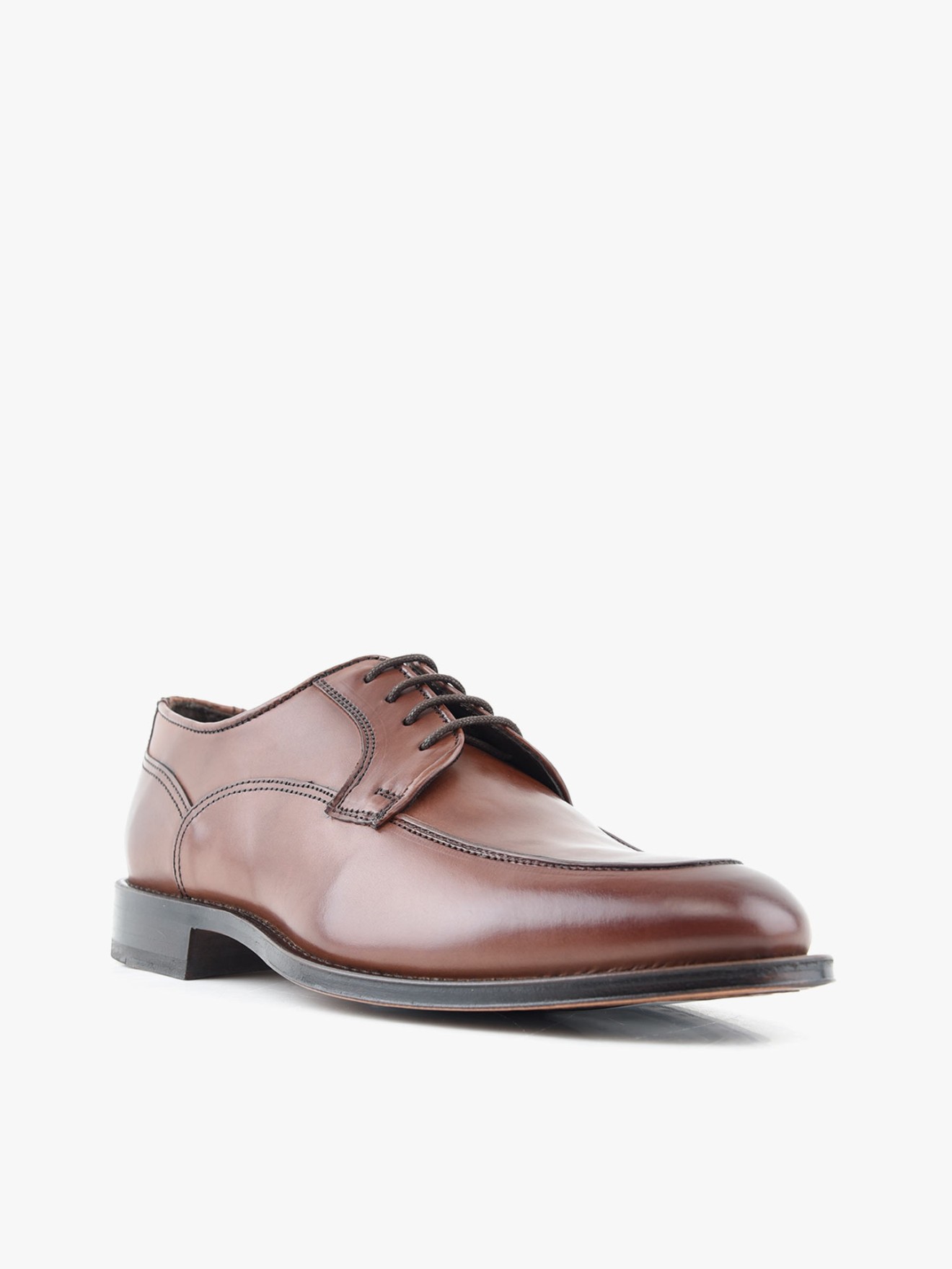 Sapatos de Pele