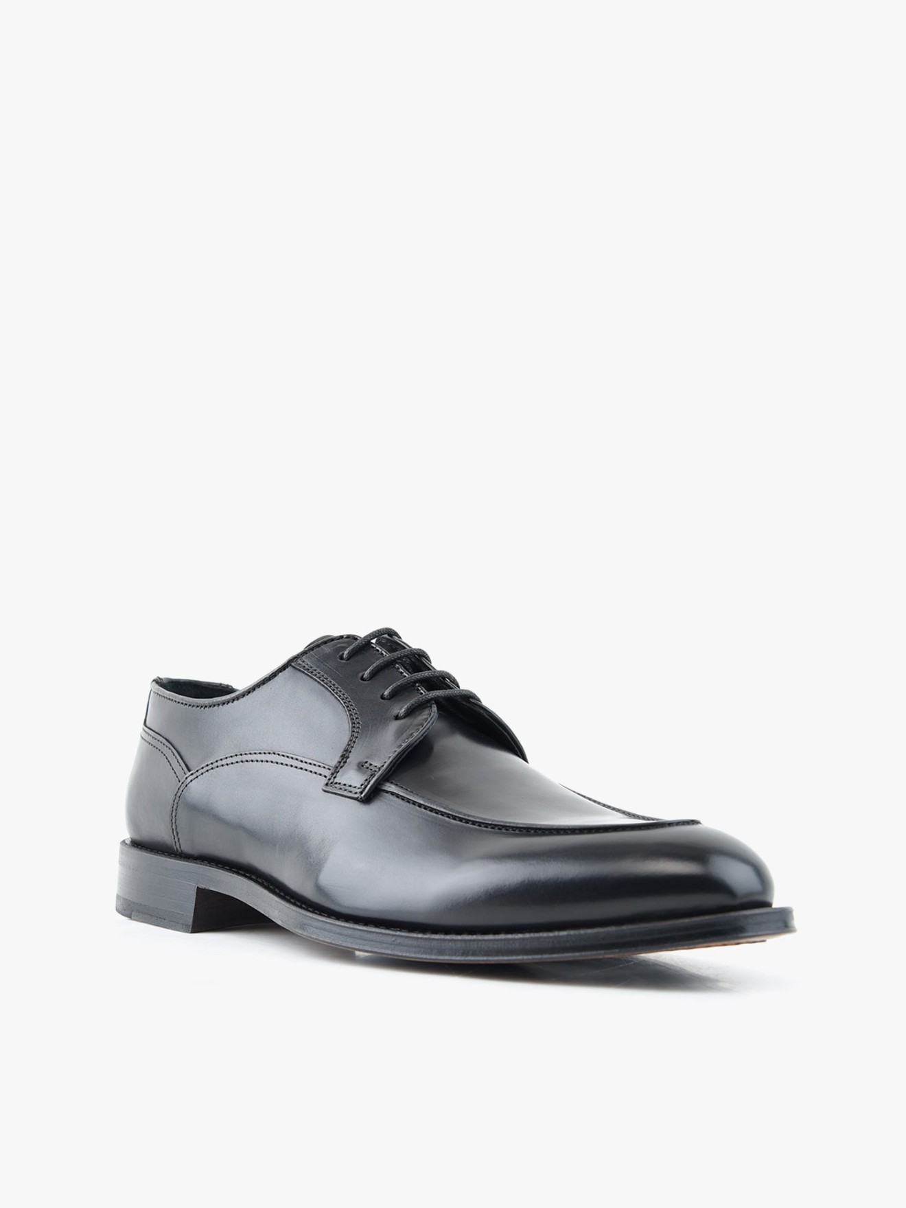 Sapatos de Pele