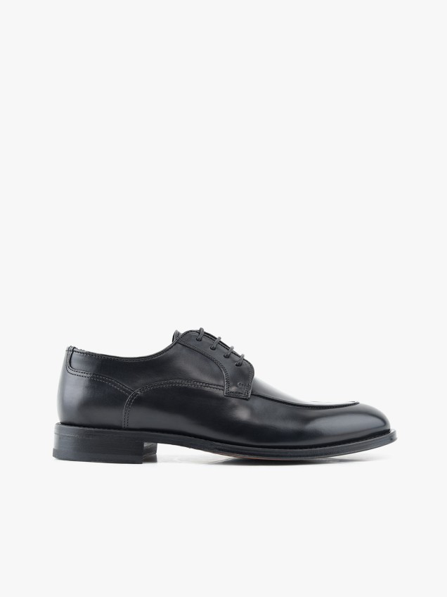 Sapatos de Pele
