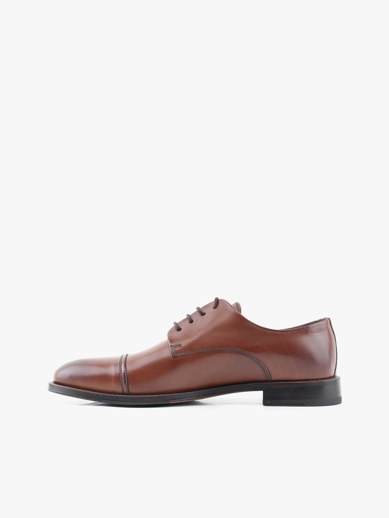 Sapatos de Pele