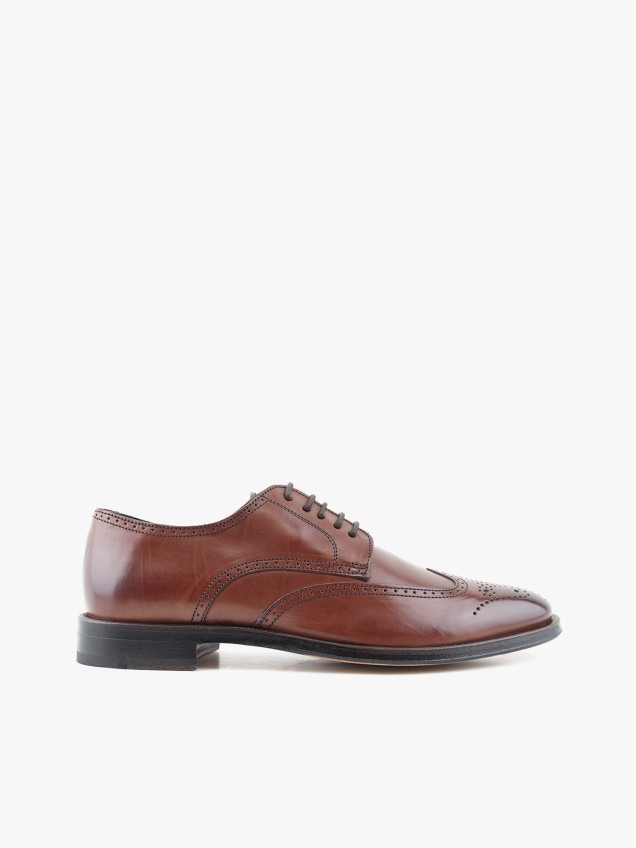Sapatos de Pele