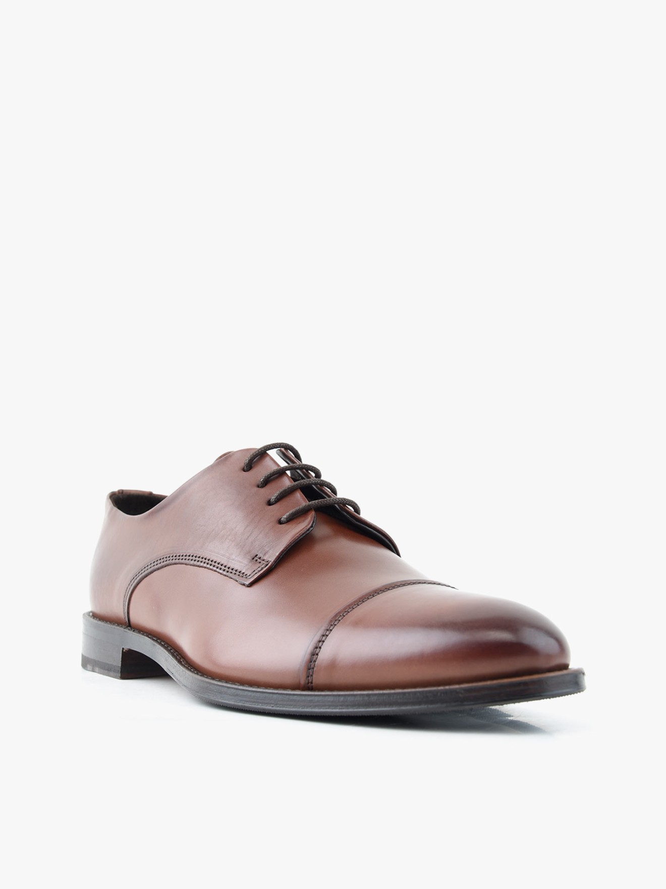 Sapatos de Pele