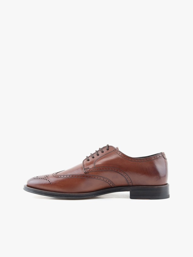 Sapatos de Pele