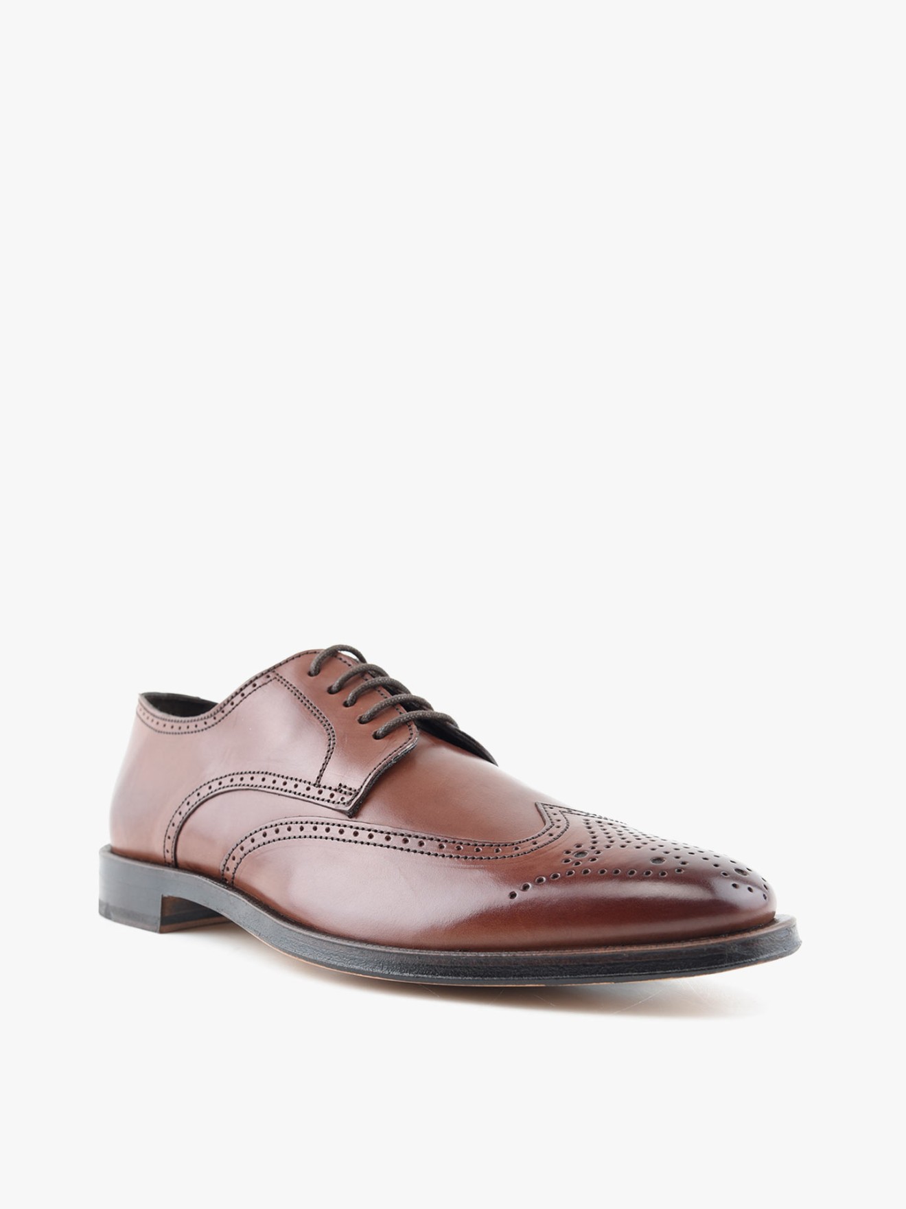 Sapatos de Pele
