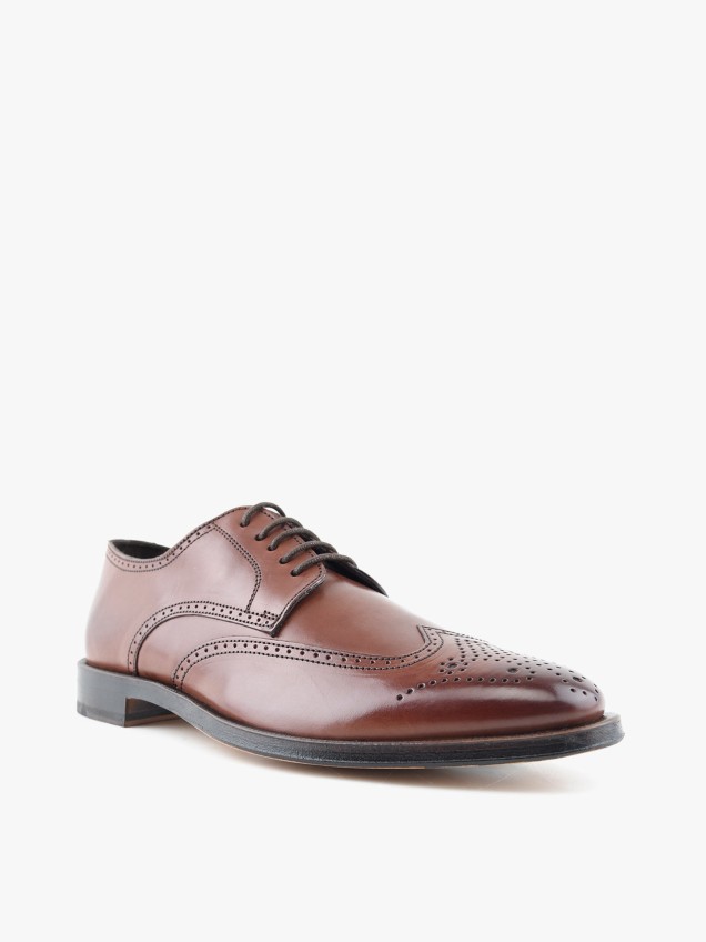 Sapatos de Pele