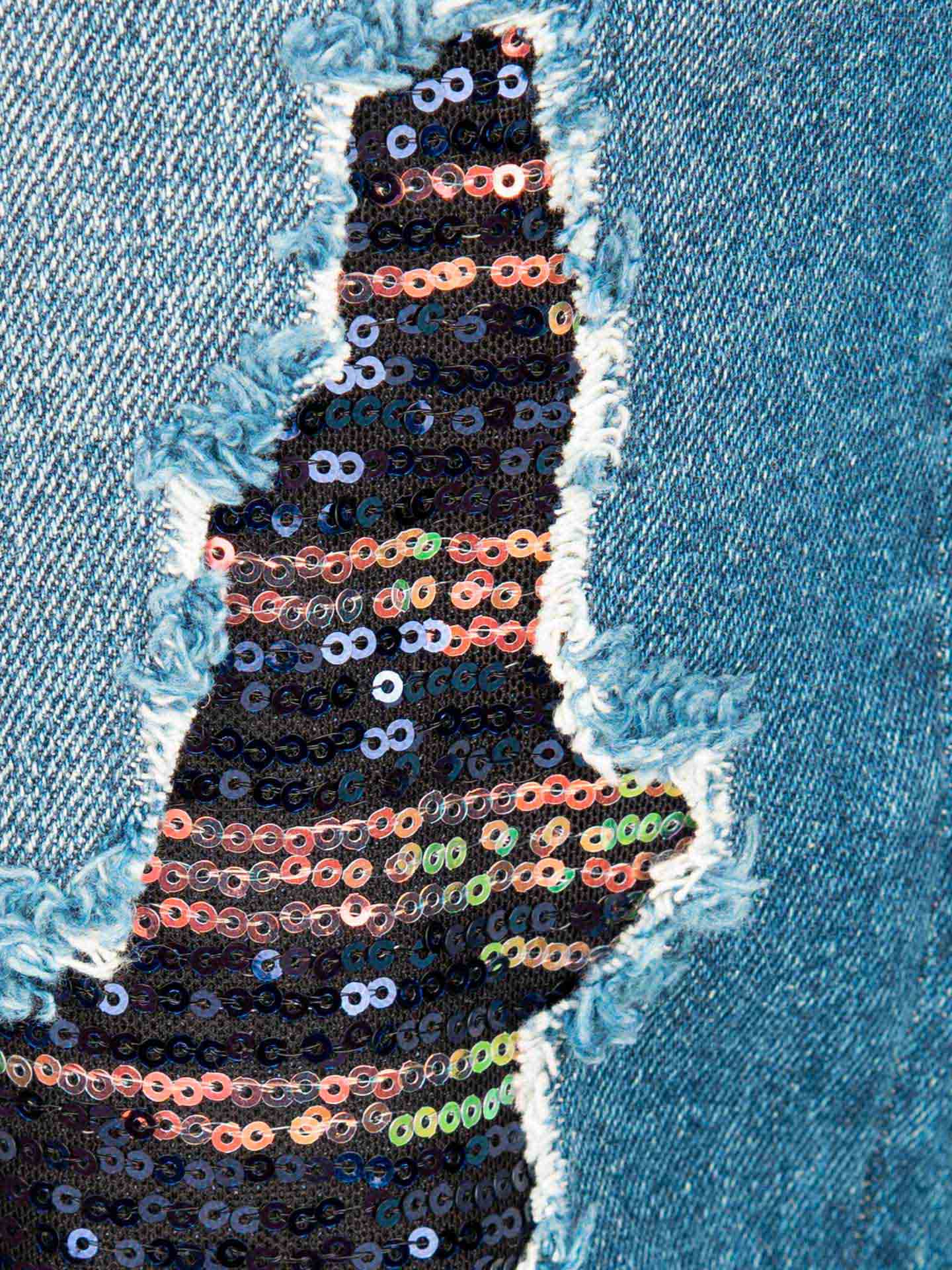 Calças de ganga com rasgões