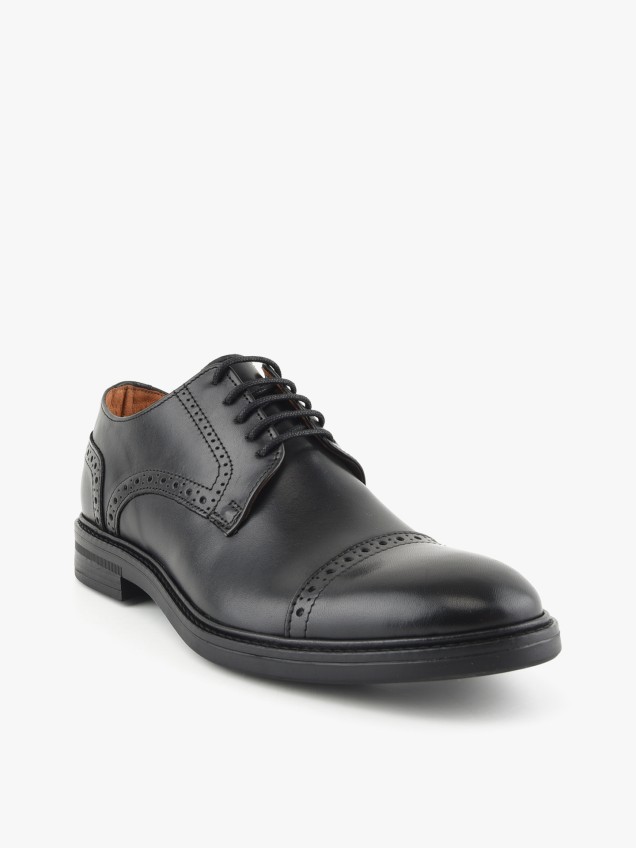 Sapatos em Pele