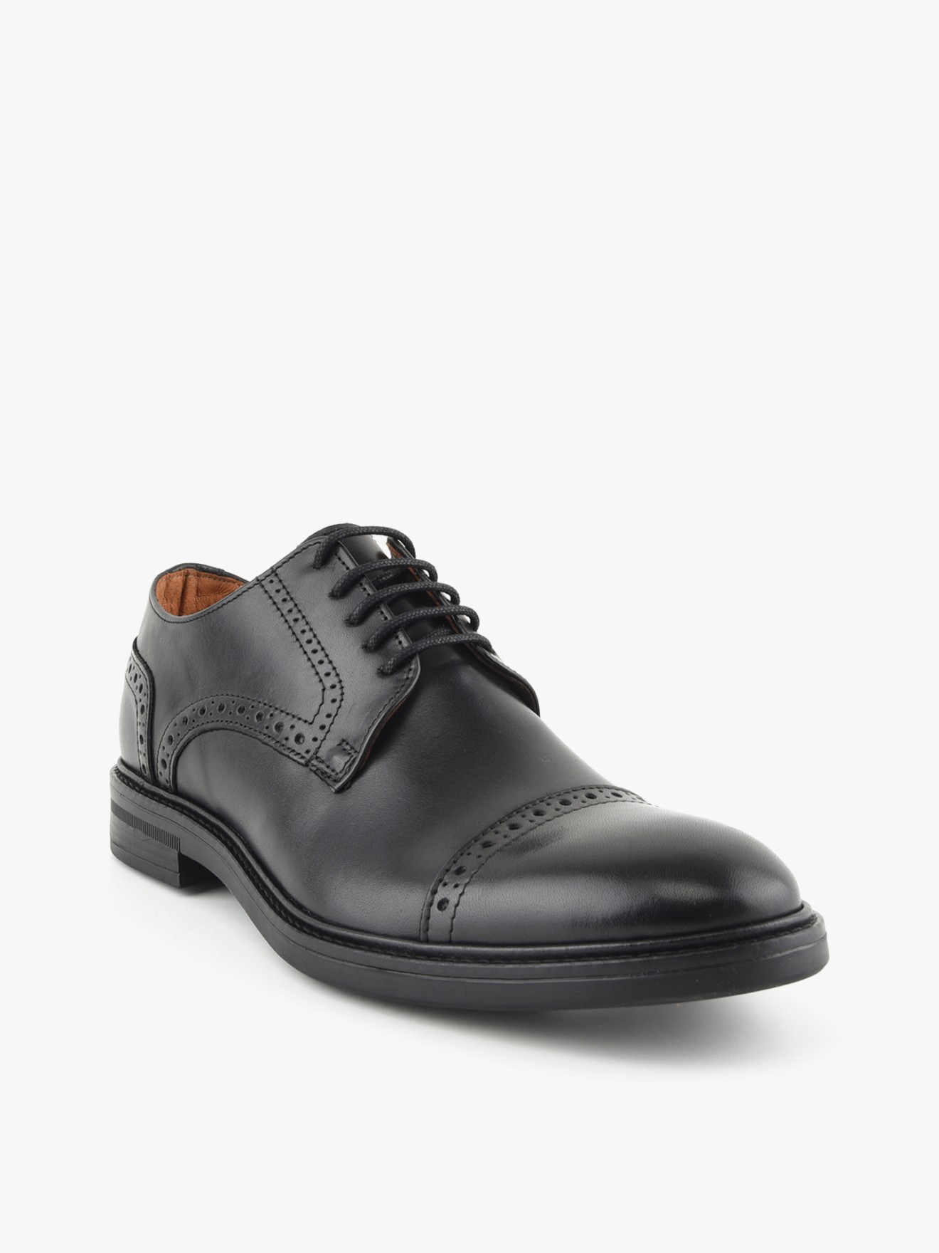 Sapatos em Pele