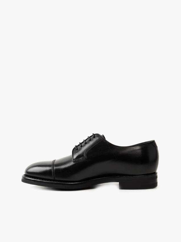 Sapatos de Pele