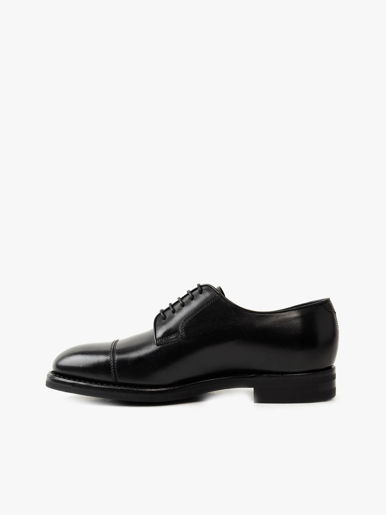 Sapatos de Pele