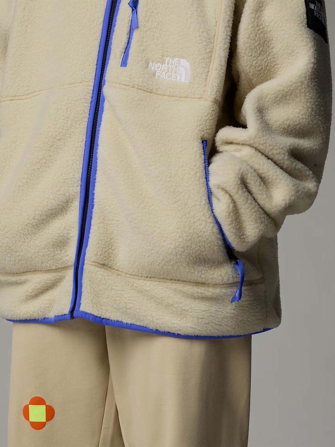 Casaco Polar Reversível TNF X Yinka Ilori