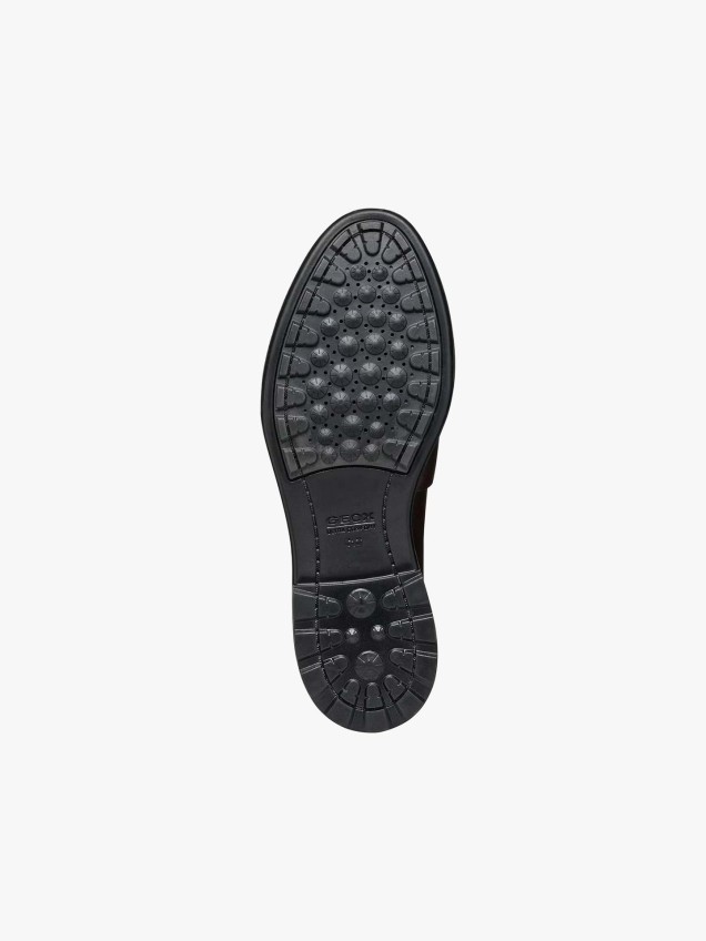 Sapatos de Pele