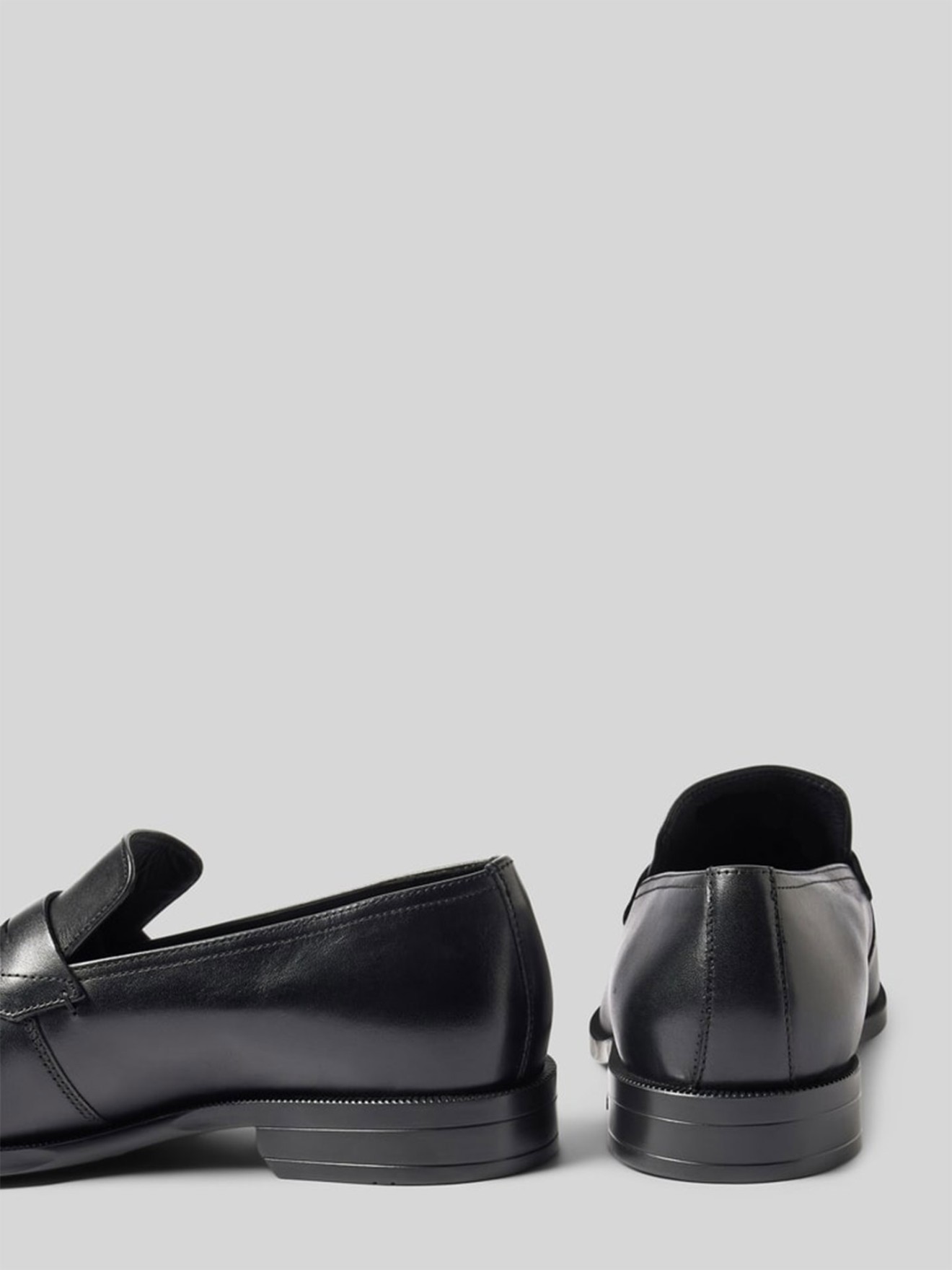 Sapatos de Pele