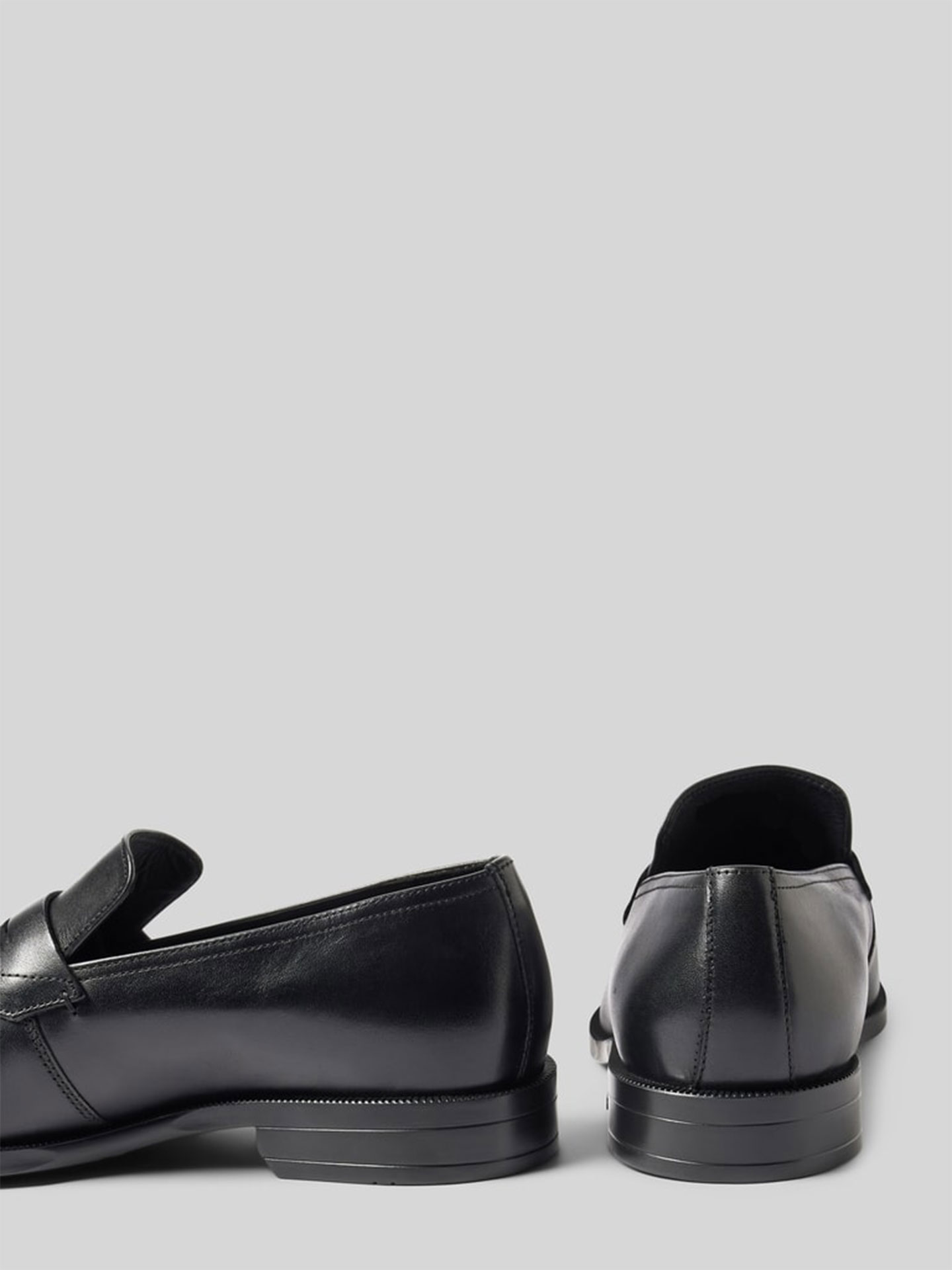 Sapatos de Pele