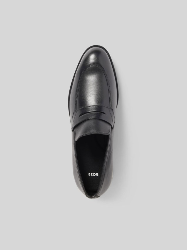 Sapatos de Pele