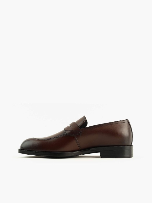 Sapatos de Pele