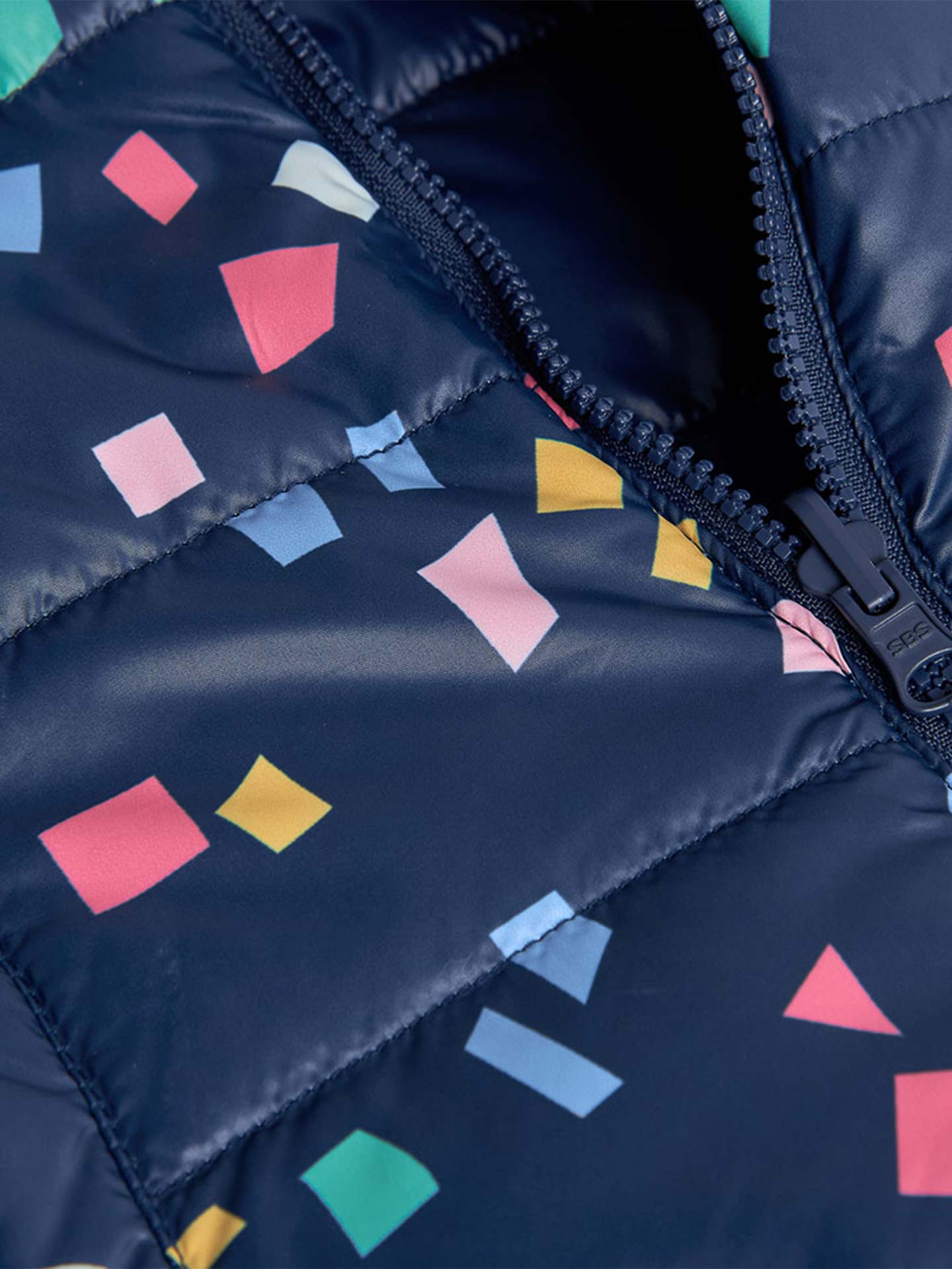 Colete acolchoado reversível