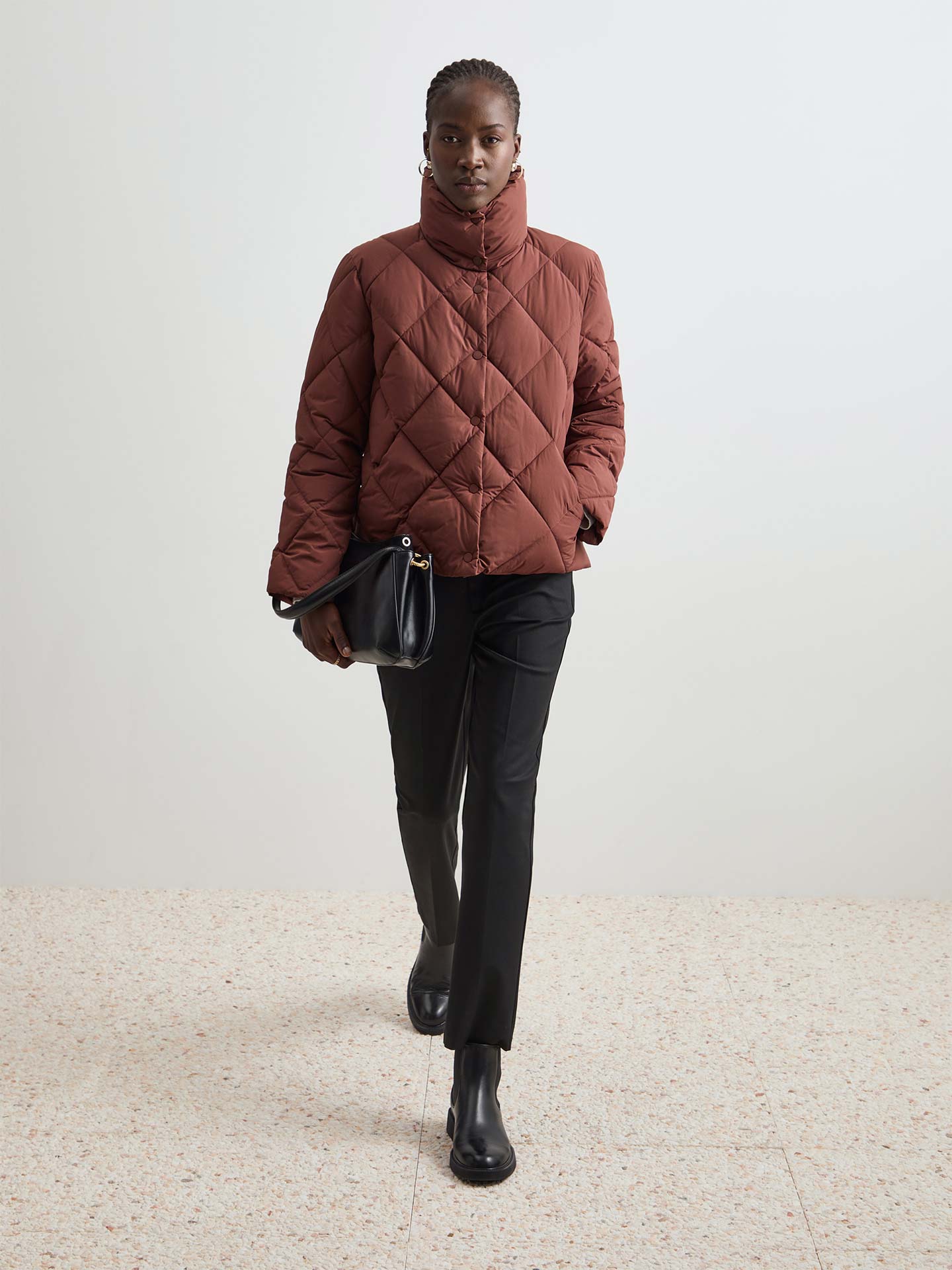 Blusão Acolchoado com Gola Alta