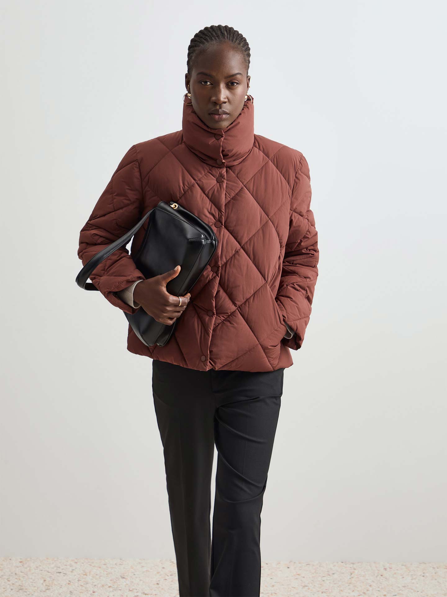 Blusão Acolchoado com Gola Alta