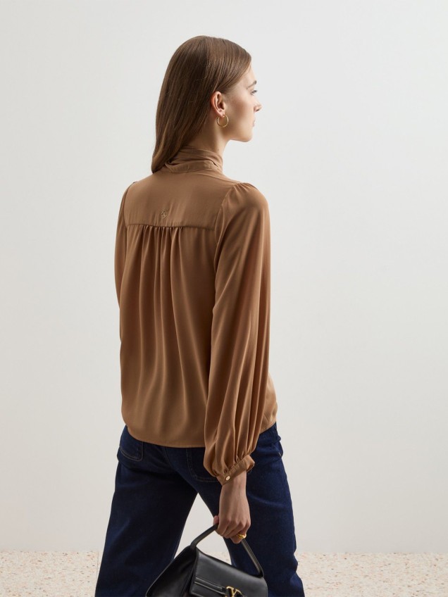 Blusa com Mangas Abalonadas
