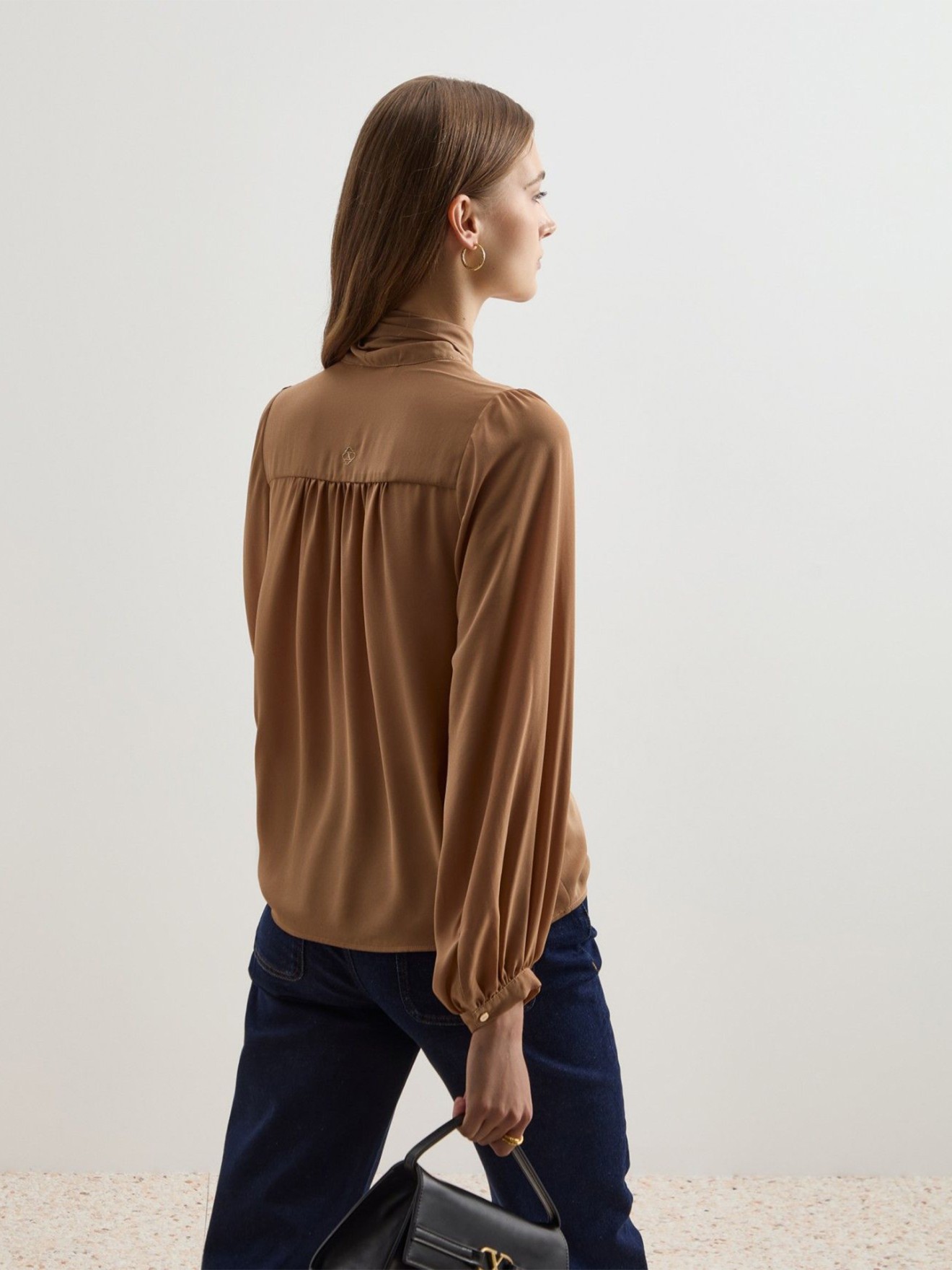 Blusa com Mangas Abalonadas