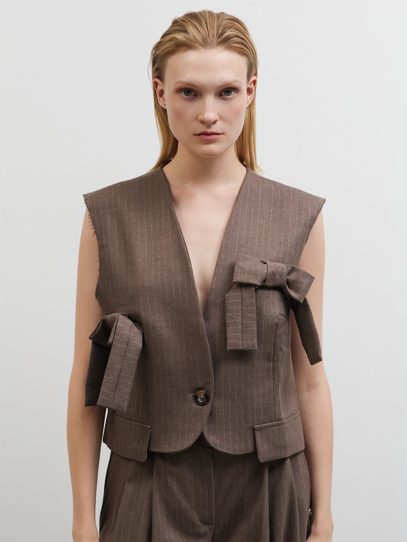 Colete �s Riscas com La�os