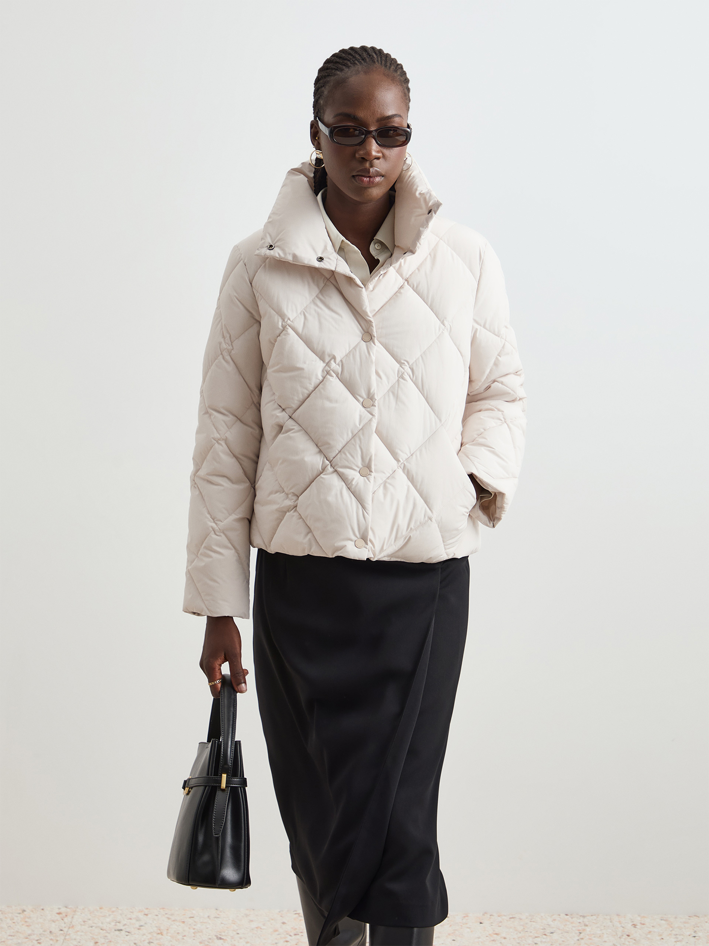 Blusão Acolchoado com Gola Alta