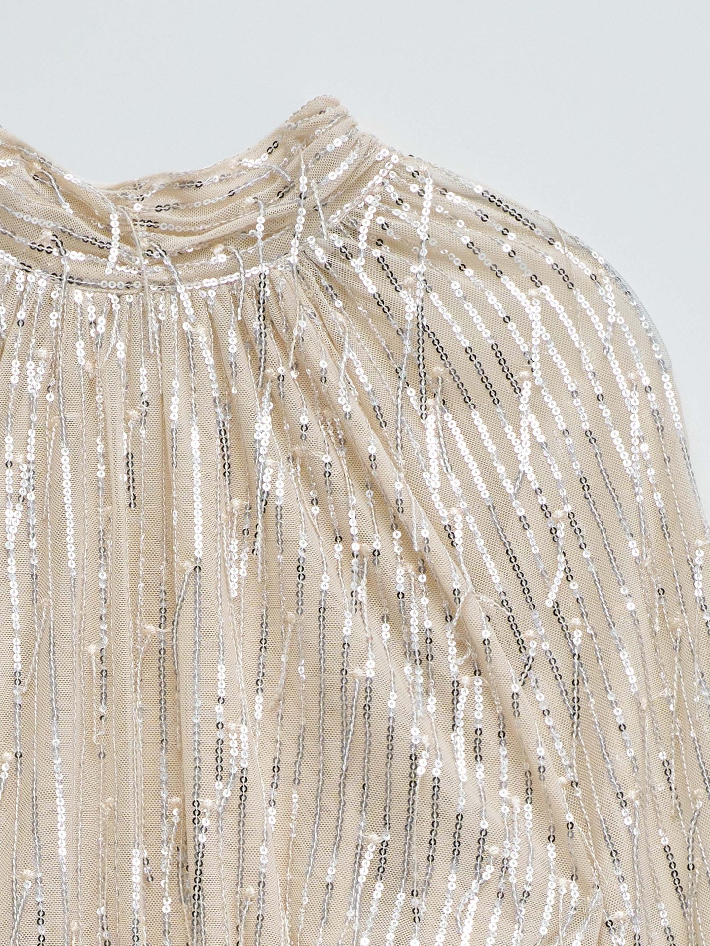 Blusa de Gola Subida com Lantejoulas