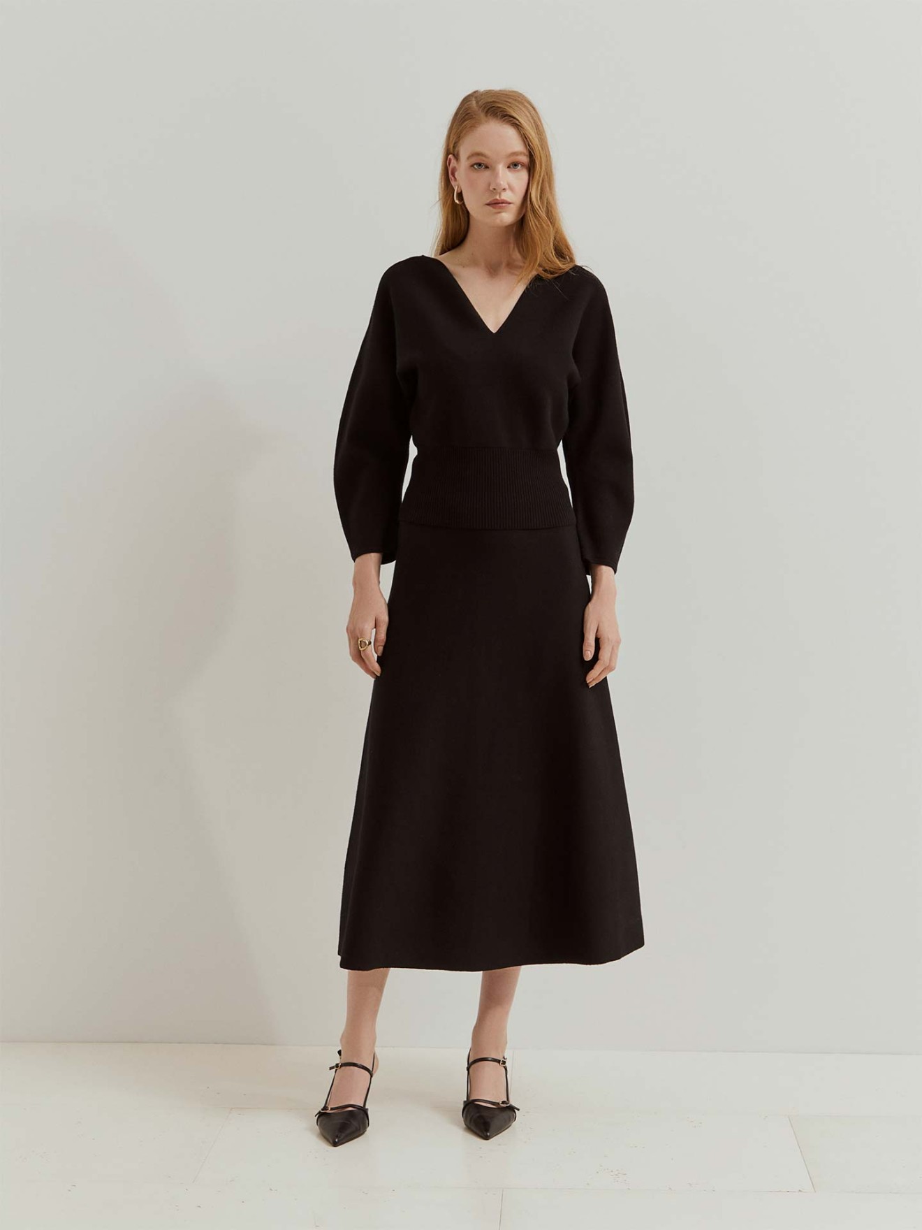 Saia de Malha Evasé