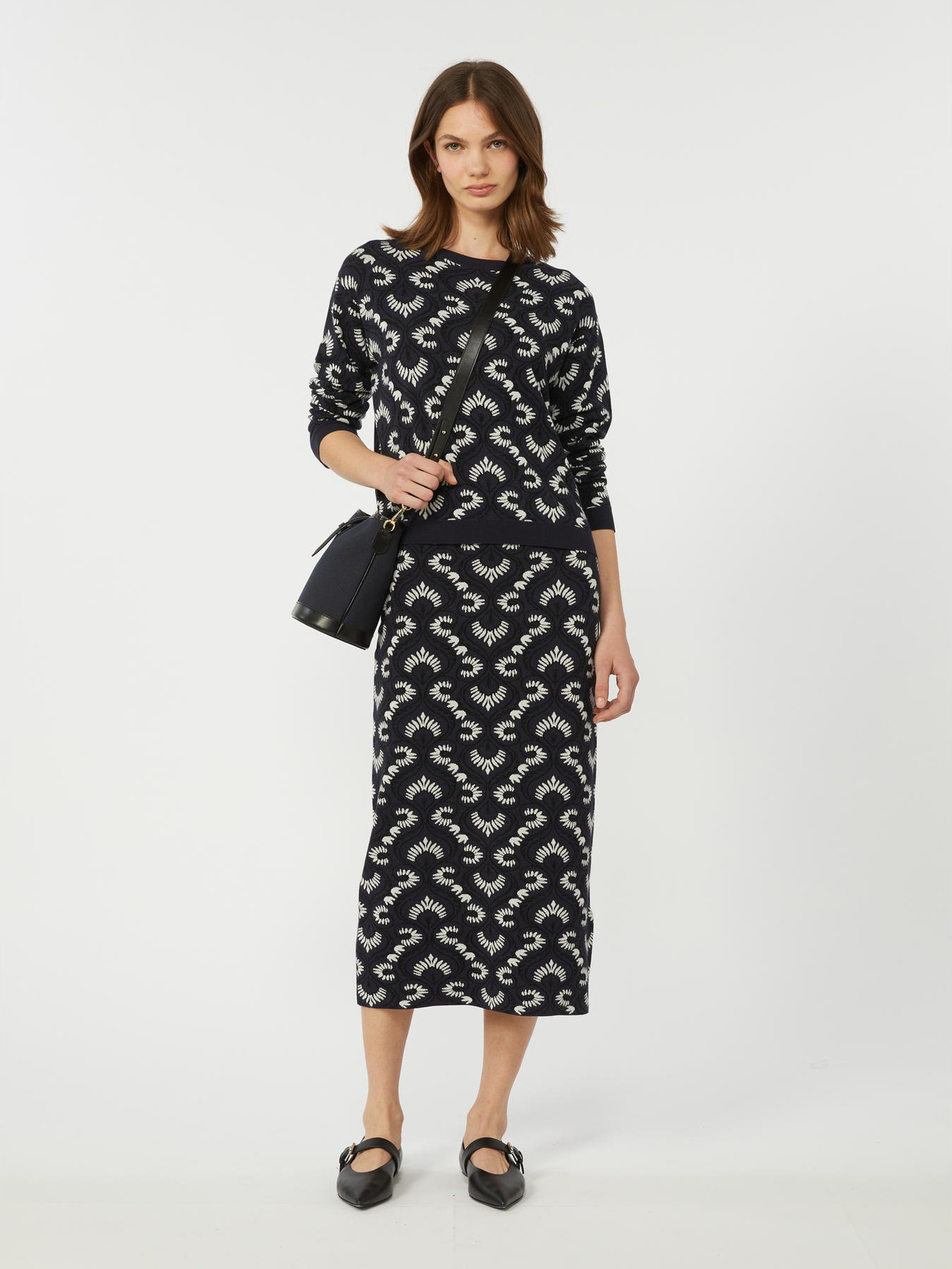 Saia Midi Lápis em Malha WKDVACUO