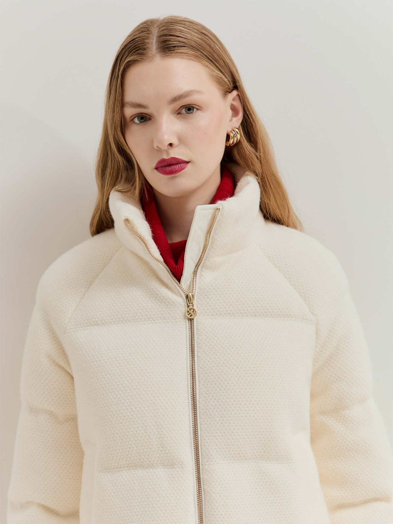 Blus�o Acolchoado em Malha Tricotada