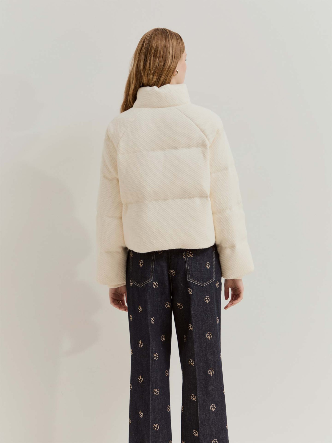 Blus�o Acolchoado em Malha Tricotada