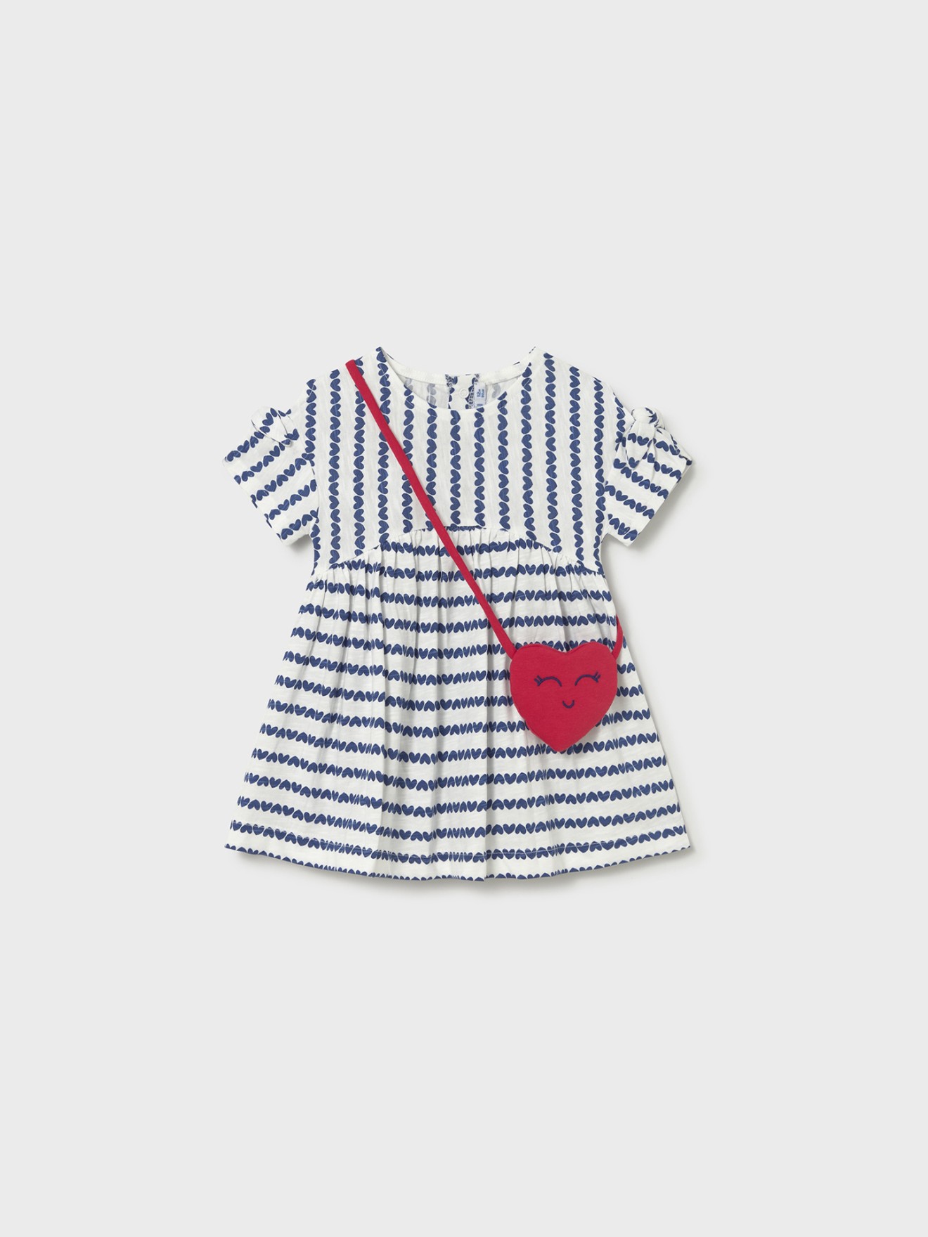Vestido com Padrão e Mala