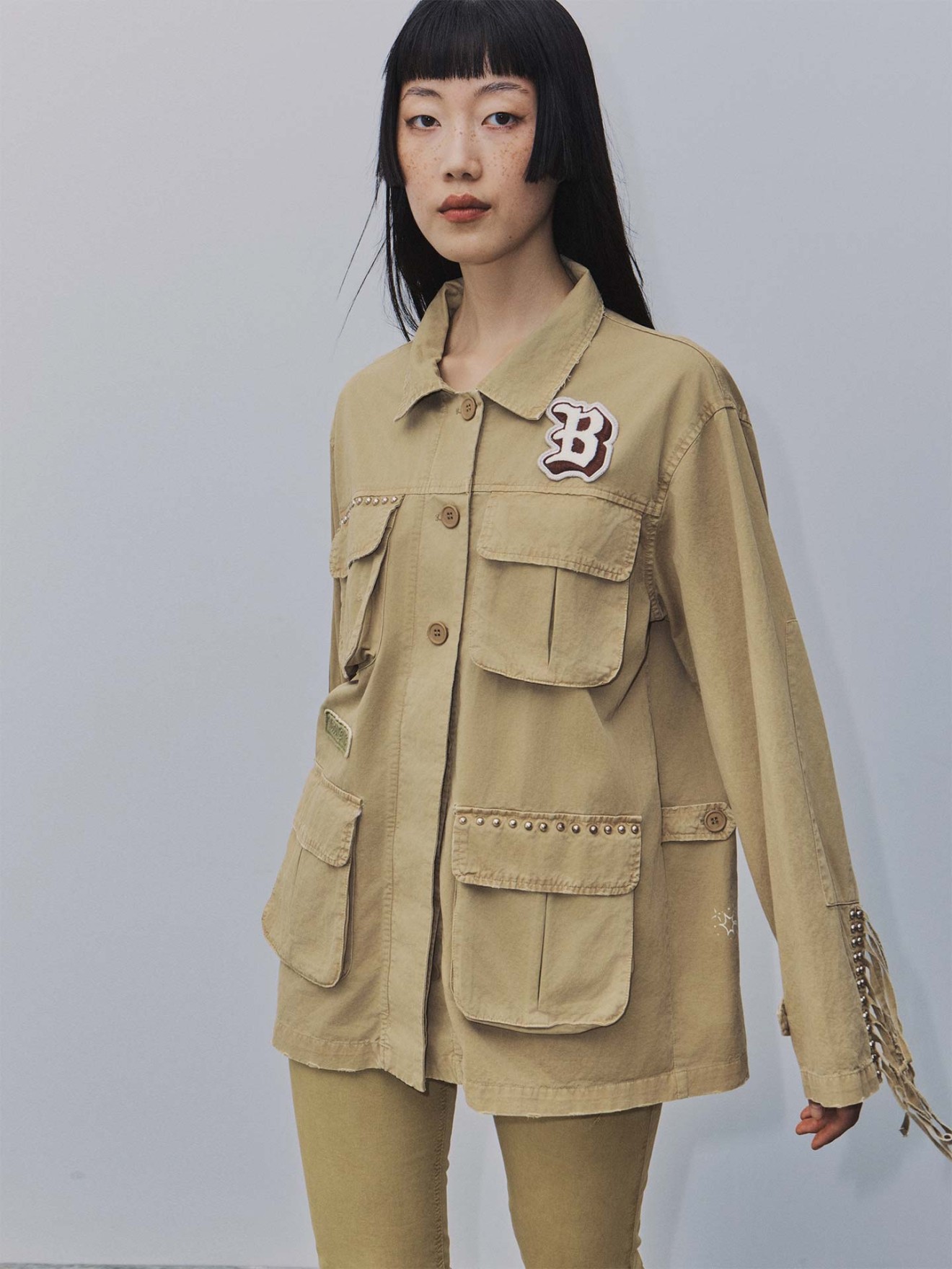 Casaco com  Tachas e Franjas