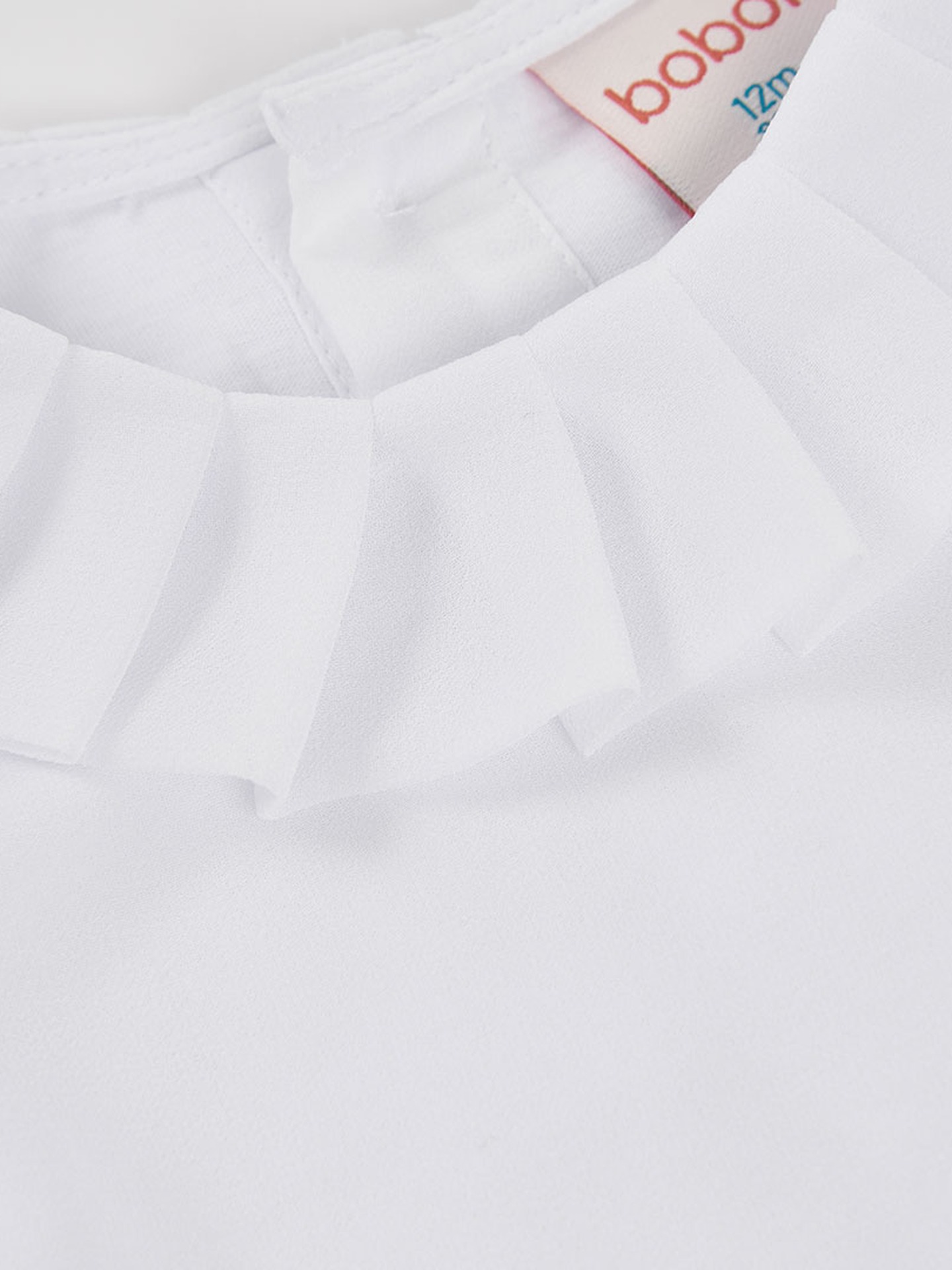 Camisola de Manga Comprida com Gola de Folhos