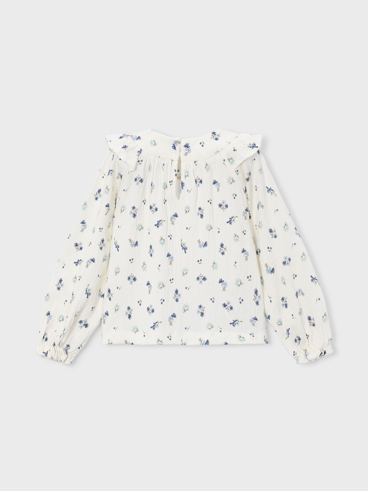 Top com Padrão Floral e Folhos