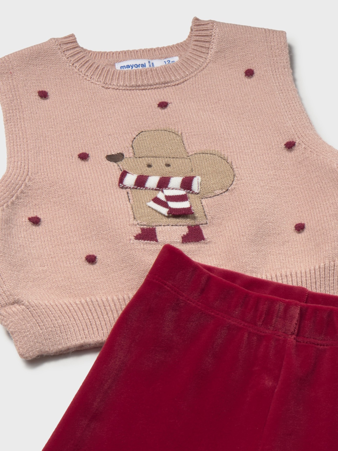Conjunto de Cal�as e Colete de Malha