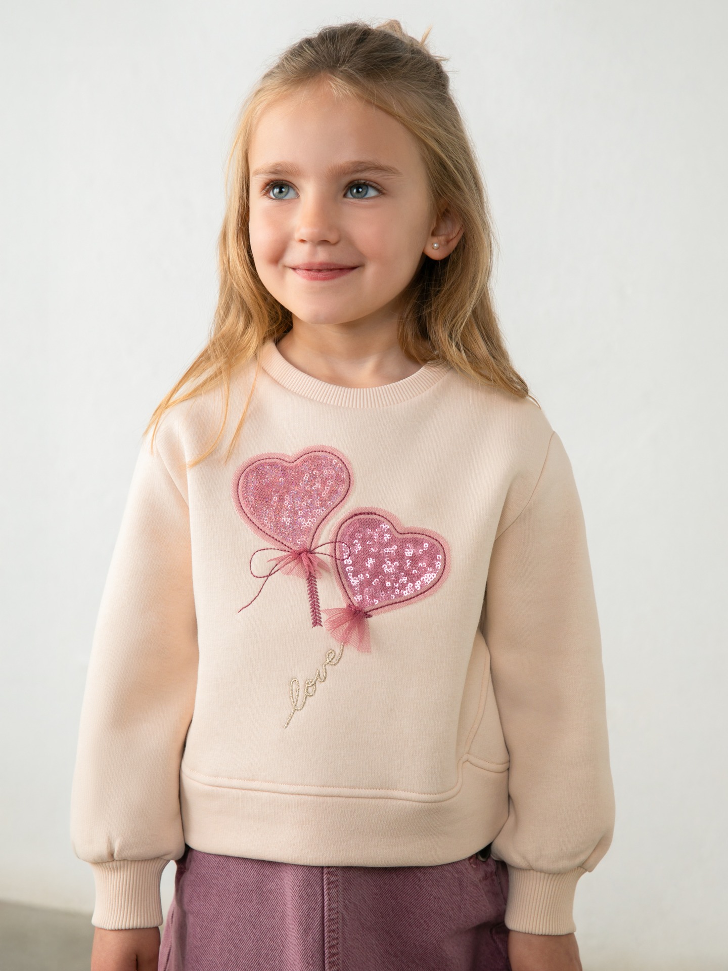 Sweatshirt com Aplicações