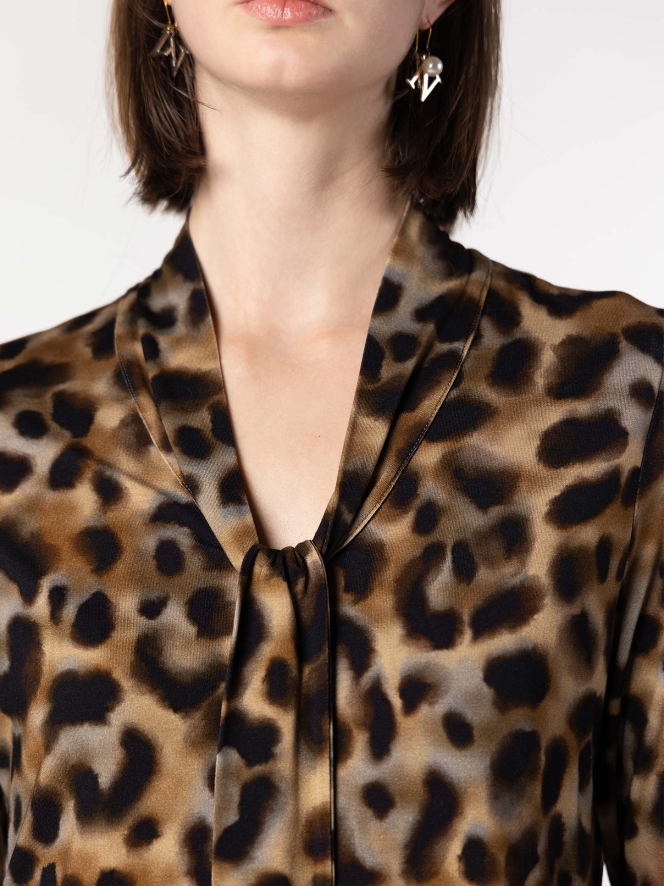 Blusa Animal Print com La�ada
