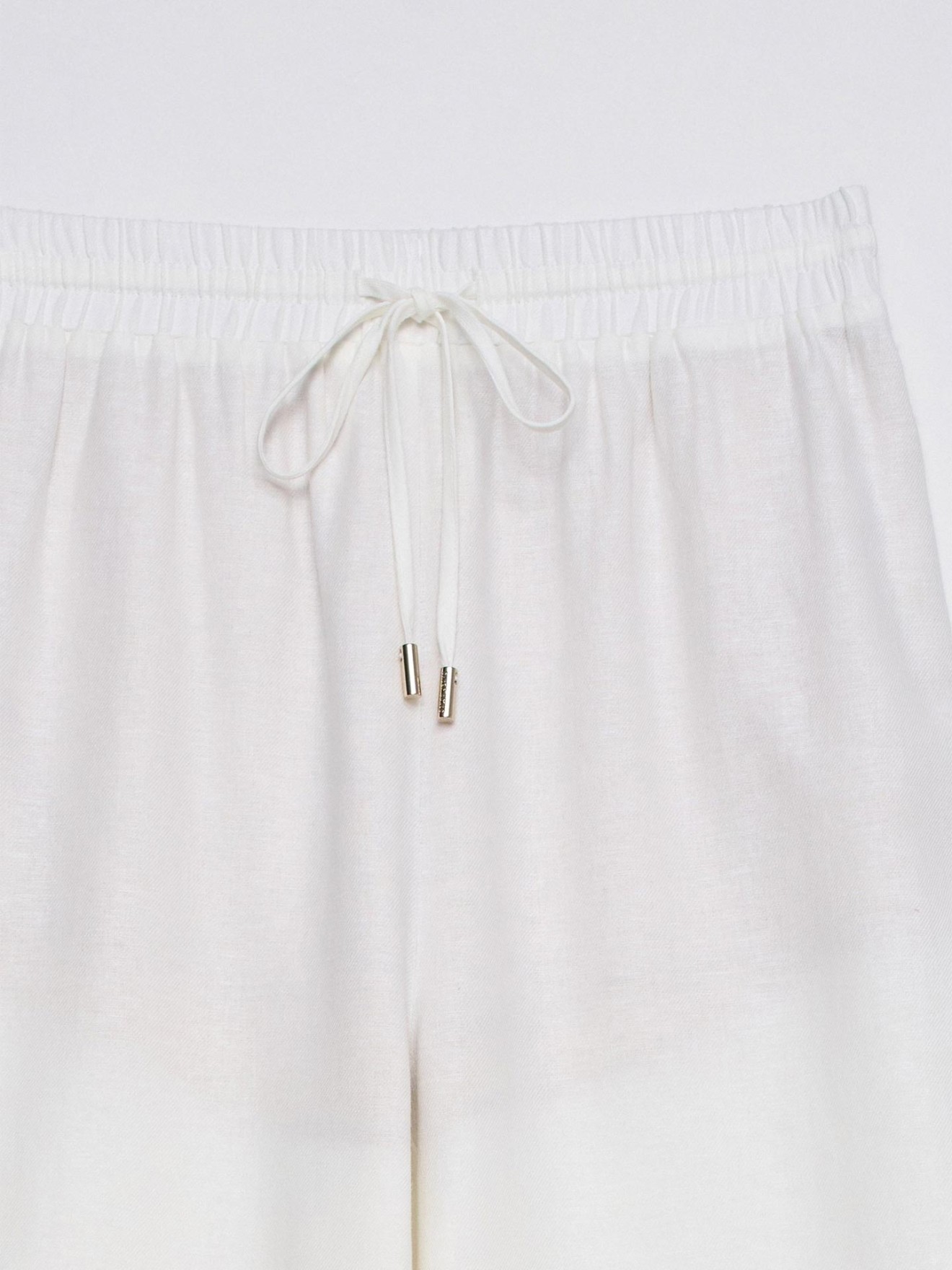 Cal�as Joggers com Linho