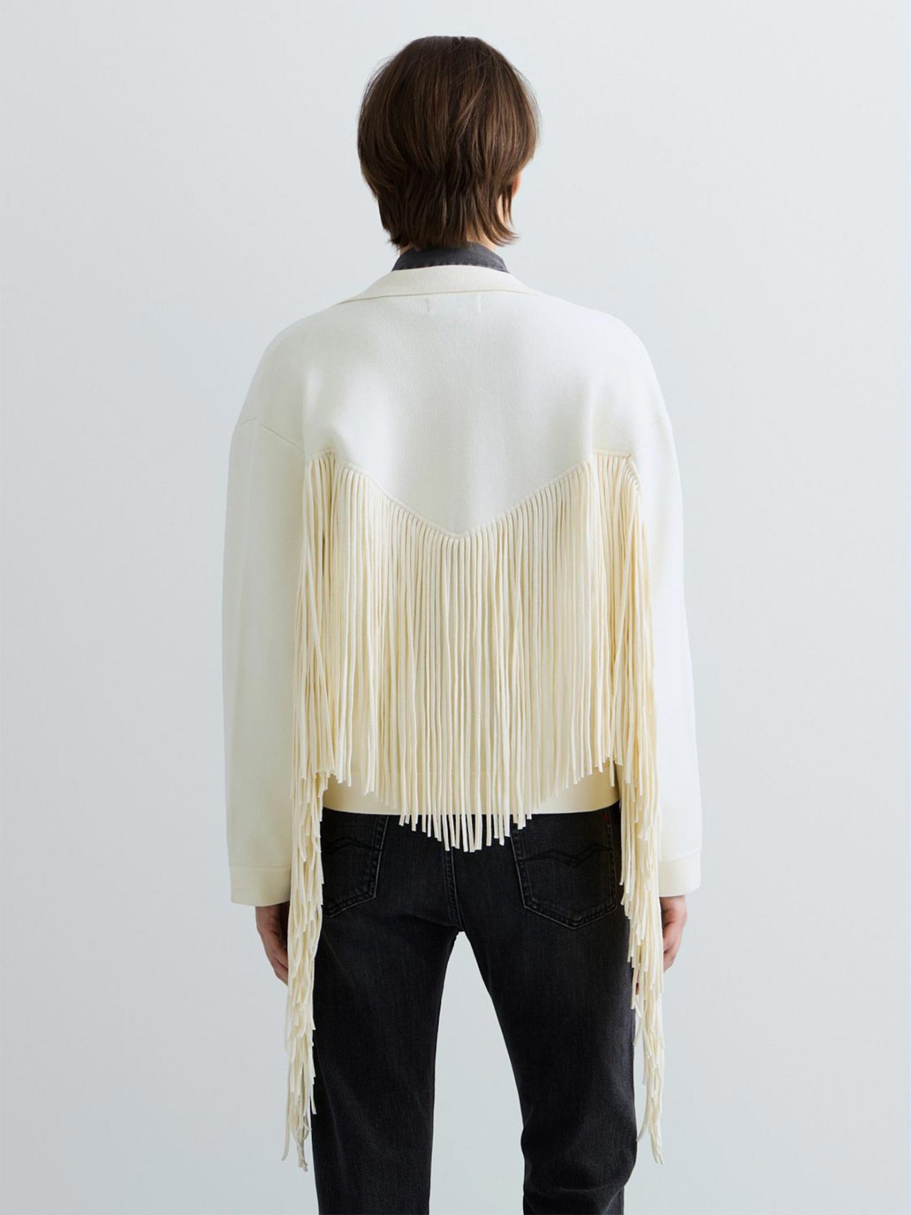 Blusão Cropped em Malha com Franjas